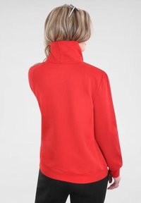 Navigazione Sweater - rot