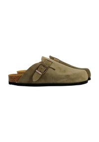 Suede clogs in olive green with a cork sole, open back, and adjustable buckle detail. Textured surface with a smooth finish.