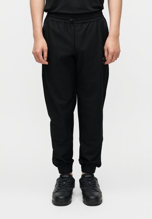 TRAIN PREMIUM KNITTED - Jogginghose - black