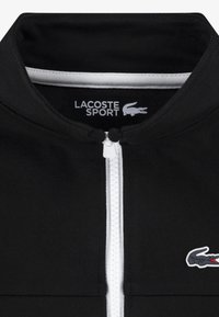 Lacoste CONTRAST SEAM TRACK - Training jacket - noir