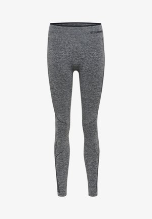 Gray leggings made of stretchy fabric with a heathered texture. Features flat seams and an elastic waistband for comfort. Logo near the waist.