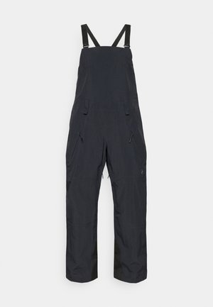 Mustamata veekindel üleüldine, millel on reguleeritavad rihmad, kahe tõmblukuga tasku ja lahtine lõige mugavuse tagamiseks, loodud välitegevusteks.