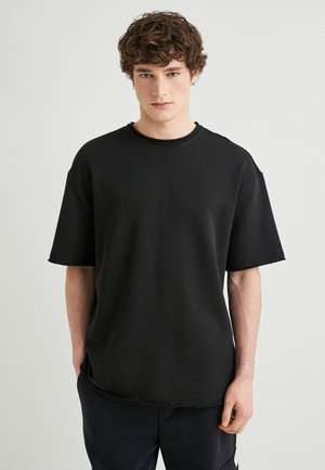 OVERSIZED TAG PRINTED - T-shirt basic - black