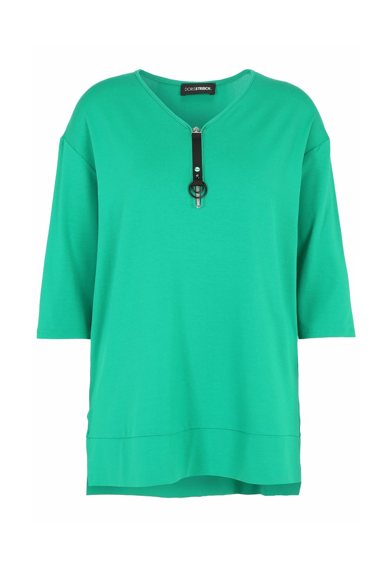 Green, short-sleeve top featuring a V-neck and a decorative zipper with a black strap and circular accent. Made from a soft, smooth material.