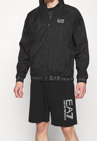 EA7 Emporio Armani Tunn jacka - black