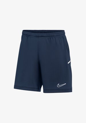 Short de sport bleu foncé avec une ceinture élastique et un logo Nike blanc sur le bas de la jambe droite, présenté sur un fond uni.
