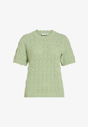 Suéter de punto verde claro de manga corta con bordes ondulados y un diseño calado con patrón de hojas.