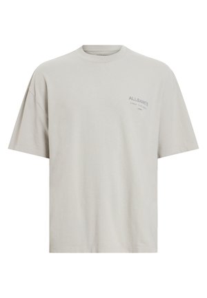 Helles graues T-Shirt mit kurzen Ärmeln aus Baumwolle. Verfügt über einen Rundhalsausschnitt und ein kleines Logo auf der linken Brustseite. Entspannter Schnitt mit glatter Textur.