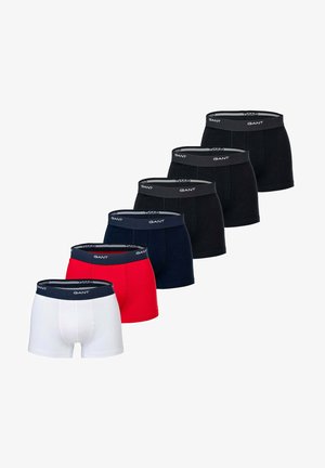 Zes paar GANT boxershorts in verschillende kleuren: wit, rood, marineblauw en zwart. Voorzien van een zwarte elastische tailleband met logo.