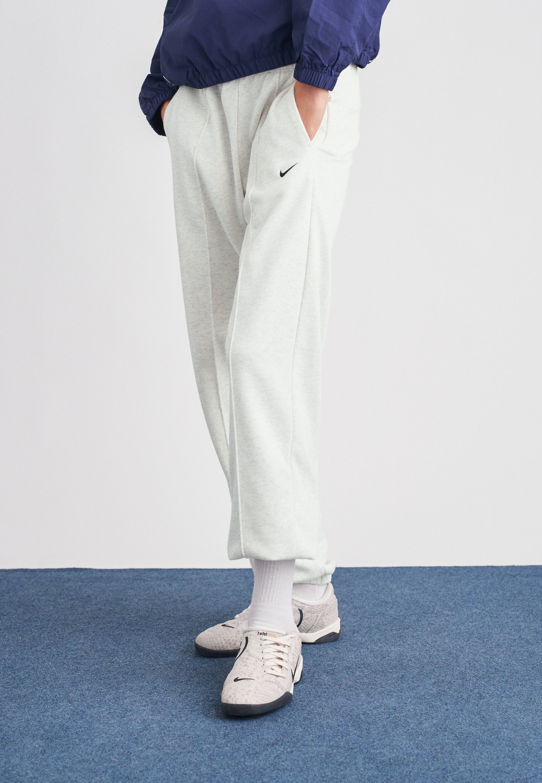 nike swoosh oversized joggers in white