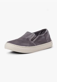 Grijze instap-schoenen van canvas met een gladde textuur, elastische zijkanten en een witte rubberen zool. Geen zichtbare patronen of hardware.