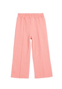 Lyserøde bukser med vidde, lavet af blødt stof, med elastisk talje og for-pleats for en afslappet pasform. Ingen lommer eller dekorationer.