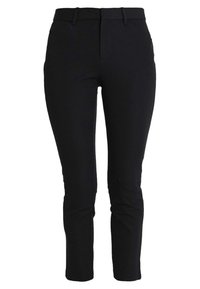 Pantalon noir ajusté, coupe slim, avec une texture lisse, taille haute et fermeture éclair. Aucun motif ou accent visible.