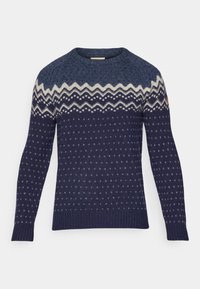 Marineblauwe gebreide trui met crèmekleurige zigzag- en stippenpatronen. Ronde hals, geribbelde manchetten en zoom, gemiddelde textuur, casual pasvorm.