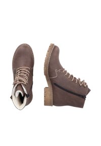 Bottes chelsea en cuir marron avec finition texturée, bout rond, lacets sur le devant, zip sur le côté et semelle en caoutchouc marron clair durable.