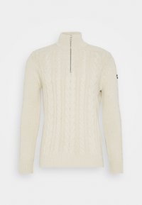 Sweter w kolorze kremowym, dziany, z wysokim kołnierzem i pół zamkiem. Posiada wzór splotu warkoczowego oraz ściągacze przy mankietach i dolnej części.