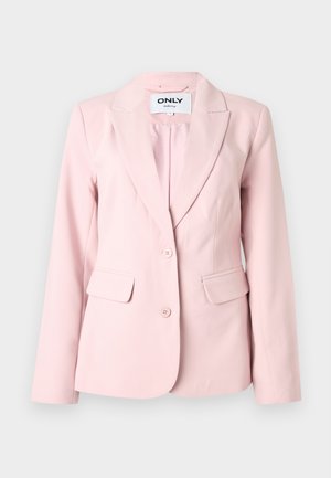 Blazer pour femmes sur mesure de couleur rose clair avec revers crantés, deux boutons et poches à rabat de chaque côté.