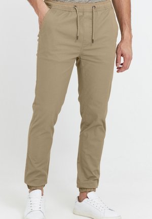 Pantalones deportivos - beige