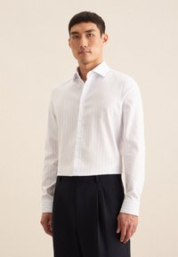 Seidensticker SLIM - Camicia elegante - light blue