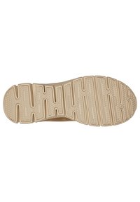 Suela de zapato con una superficie de goma texturizada de color beige. Presenta un patrón ondulado con ranuras alternas y secciones elevadas para mayor tracción.