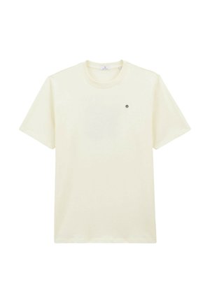 T-shirt en coton couleur crème avec des manches courtes, un col rond et un petit logo circulaire sur le côté gauche de la poitrine. Texture lisse.