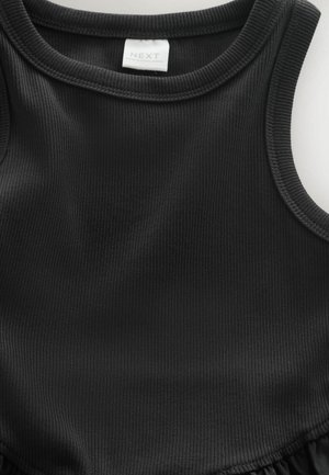 Fekete bordázott anyagból készült ujjatlan top, kerek nyakkivágással, fodros szegéllyel és belső címkével.