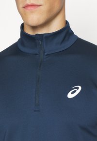 ASICS CORE ZIP WINTER - Pikkade varrukatega topp - french blue