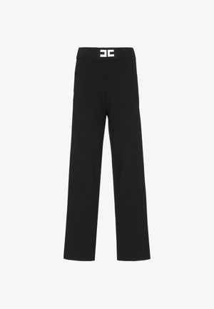 Pantaloni neri a gamba larga con una vita testurizzata che presenta un logo bianco. Realizzati in un tessuto liscio, offrono una vestibilità comoda.