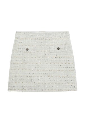 White tweed mini skirt with a textured finish, featuring two front pockets and metallic button accents.
