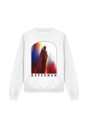 White sweatshirt featuring a blurred, colorful image of Superman standing with cape flowing, looking upward, with "SUPERMAN" text below.