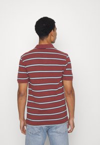 Levi's® Polo - grounded cinnamon/stick blue