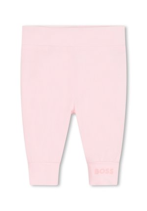 Leggings roses en coton doux, présentant un design simple avec une taille côtelée et le logo "BOSS" embossé sur l'ourlet gauche.