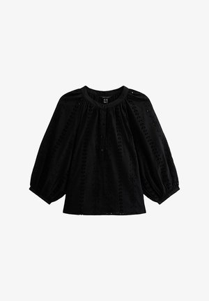 Schwarze Bluse mit rundem Halsausschnitt, Knopfleiste und 3/4-Puffärmeln. Durchgehend mit einer Lochmusterung und strukturierten Blumenmotiven. Weicher Stoff.