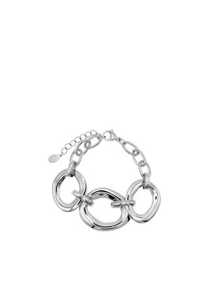 Silver chain bracelet with three large irregular oval links and a lobster clasp with an adjustable chain extender.