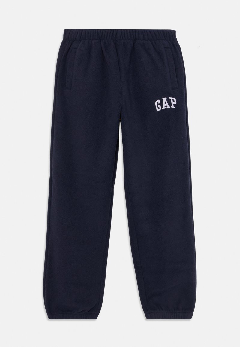 Mornarice iz udobnega blaga, z elastičnim pasom, stranskimi žepi in belim logotipom "GAP" na levi stegn.