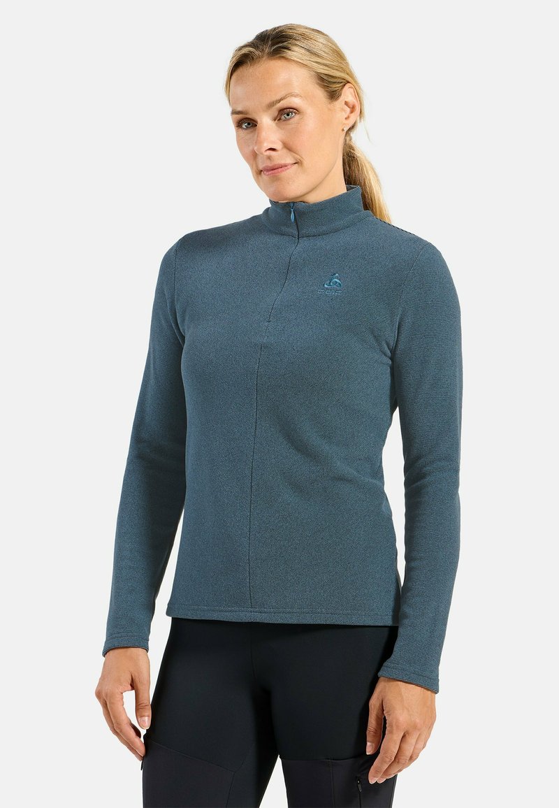 Langärmliger, mit Reißverschluss versehenen Pullover aus meliertem dunkelblauem Stoff mit taillierter Form und strukturiertem Design; enthält ein kleines Logo auf der Brust.