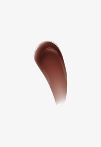 Crème brune avec une texture lisse et brillante, en forme de goutte. Présente un doux dégradé allant du brun foncé au brun clair.