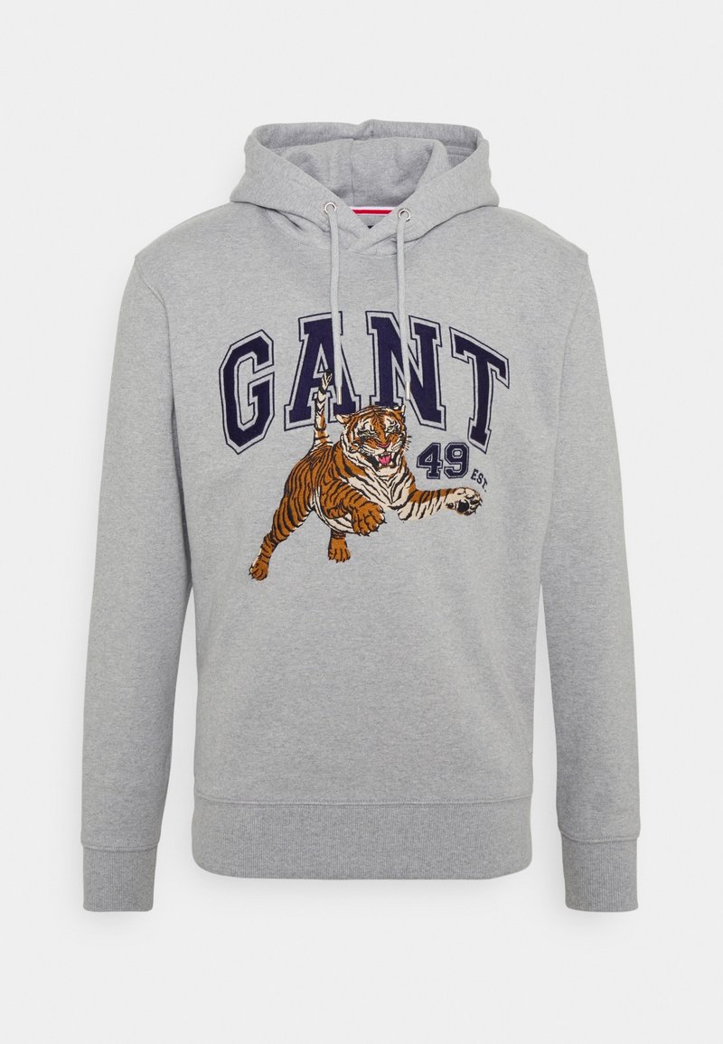 Haut à capuche gris avec le texte "GANT" et un graphique de tigre brodé. Cordon de serrage à la capuche et poignets et ourlet côtelés.