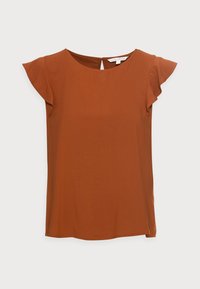 Blusa de color naranja quemado con mangas cortas con volantes, cuello redondo y detalle de ojal en la parte posterior. Fabricada en tejido ligero y suave.