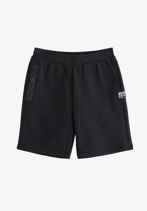 Sorte afslappede shorts med elastik i taljen, to sidelommer, en lynlåslomme på venstre side og et lille hvidt logo på højre ben.