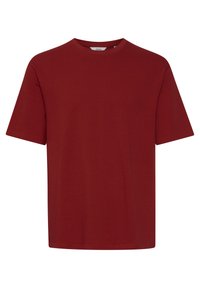 Red crew-neck t-shirt, short sleeves, made from a smooth cotton blend, relaxed fit, no visible patterns or embellishments.