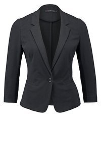 Musta bleiseri, jossa on räätälöity malli, pitkät hihat, yksirivinen napitus ja kaksi etutaskua. Sileä kangas, jämäkkä muoto.