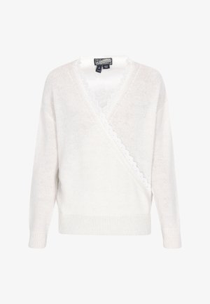 White knitted wrap sweater with a deep V-neck, scalloped lace trim, long sleeves, and a ribbed hem at the cuffs and bottom.