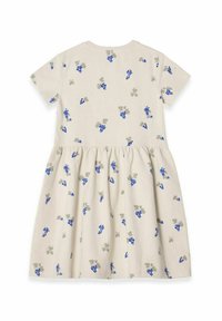 Blomstret kjole med korte ærmer, beige ribbet stof, med blå drueklaser og grønne blade jævnt fordelt over ryggen.