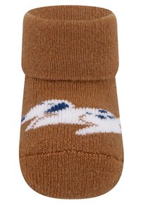 Calzino per bambino in cotone marrone, con risvolto, caratterizzato da un design di coniglio bianco e blu sul lato. Texture morbida, punta arrotondata.