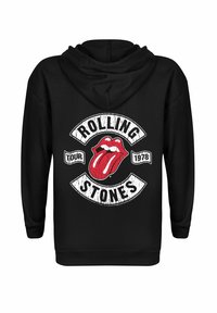 Schwarzer Kapuzenpullover mit einem abgenutzten weißen und roten Grafikdesign, das eine Zunge und den Text "ROLLING STONES" sowie "TOUR 1978" zeigt. Standard Passform.