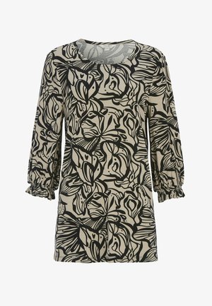 Beige long-sleeve blouse with black abstract floral and leaf patterns, elasticated cuffs, and a round neckline.