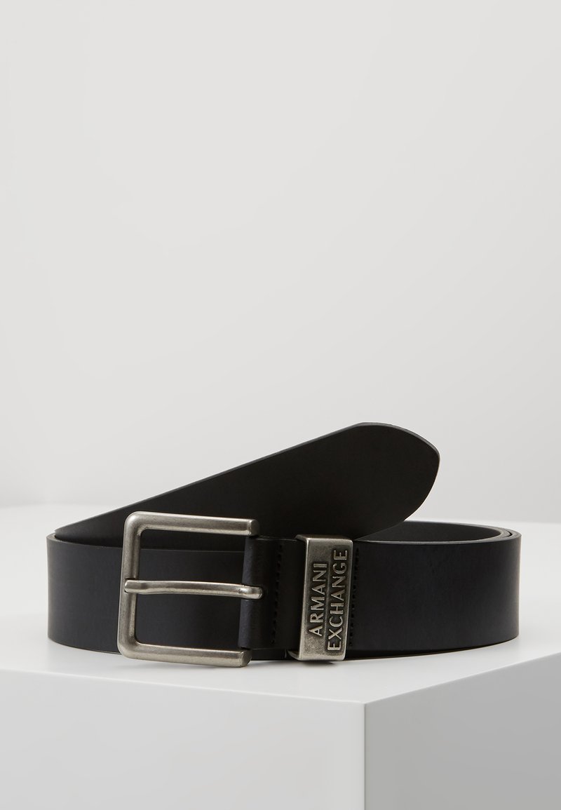 Black leather belt featuring a silver metal buckle with an engraved "Armani Exchange" logo. Smooth texture, minimalist design, and a classic shape.