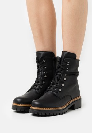 Lace-up ankle boots - schwarz