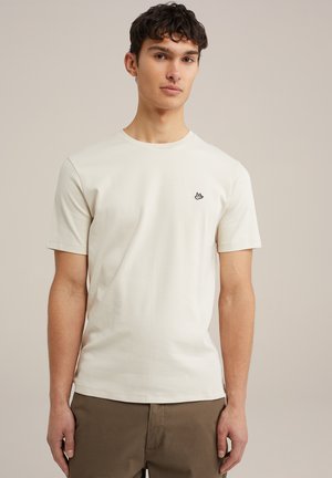 T-shirt a maniche corte di un beige chiaro, realizzato in un morbido cotone misto, con un piccolo logo nero ricamato sul lato sinistro del petto.